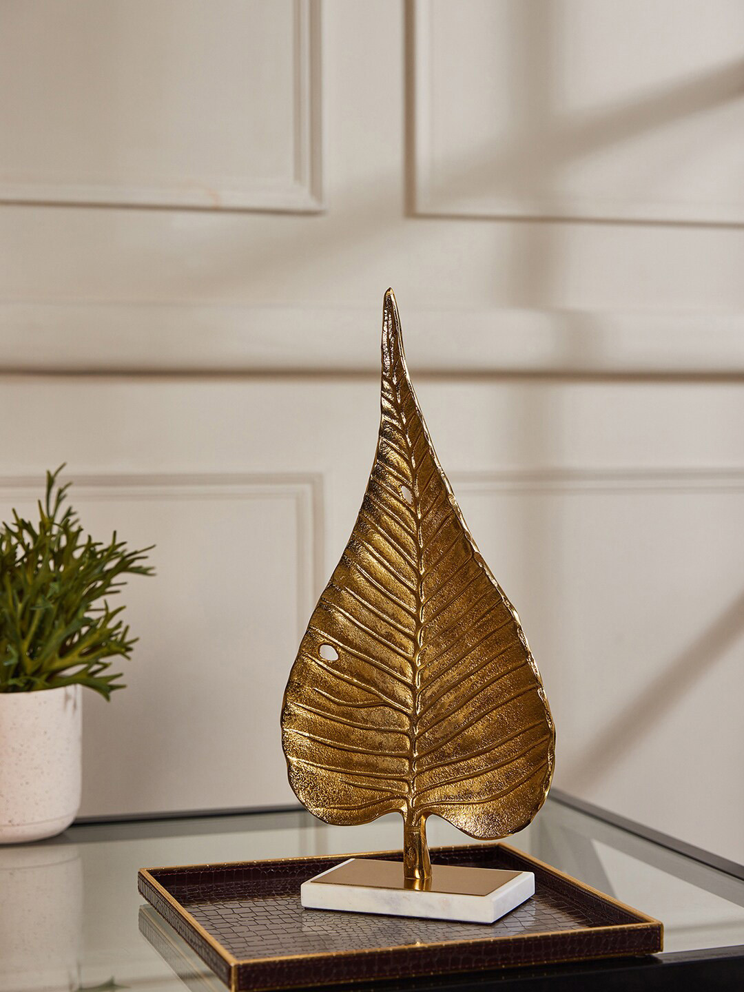 

Pure Home and Living Gold-Toned Boddhi Leaf Stand showpiece