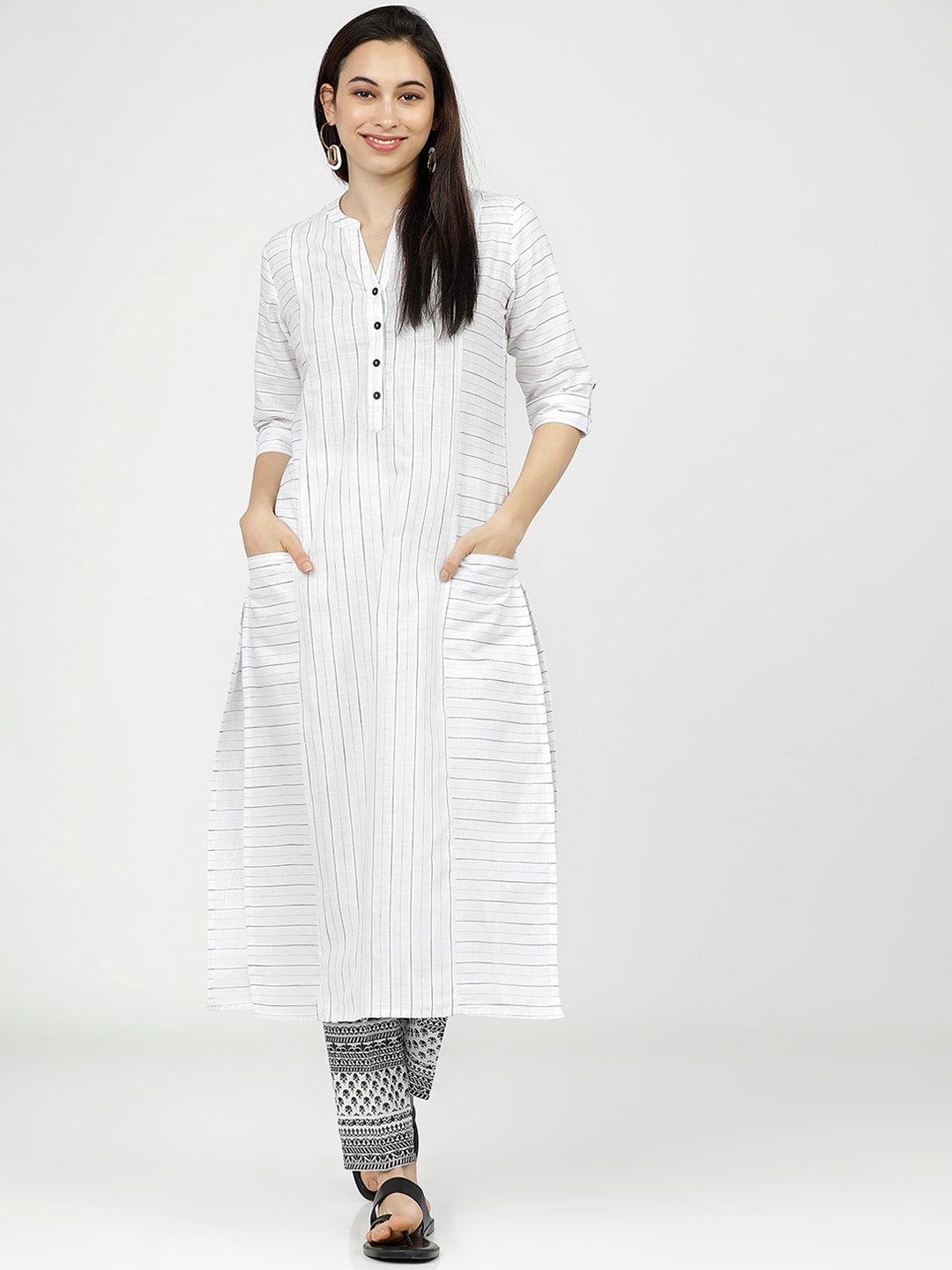 

Vishudh Women White & Black Striped Regular Pure Cotton Kurta with Trousers