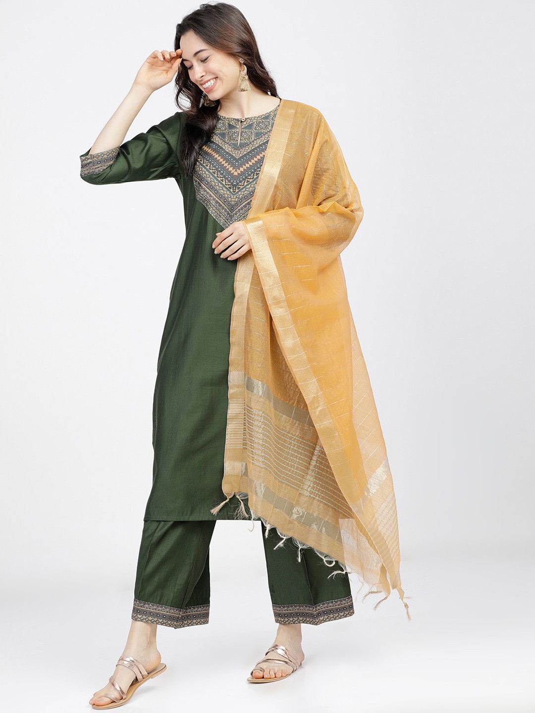 

Vishudh Women Green & Orange Yoke Design Regular Kurta with Trousers & Dupatta