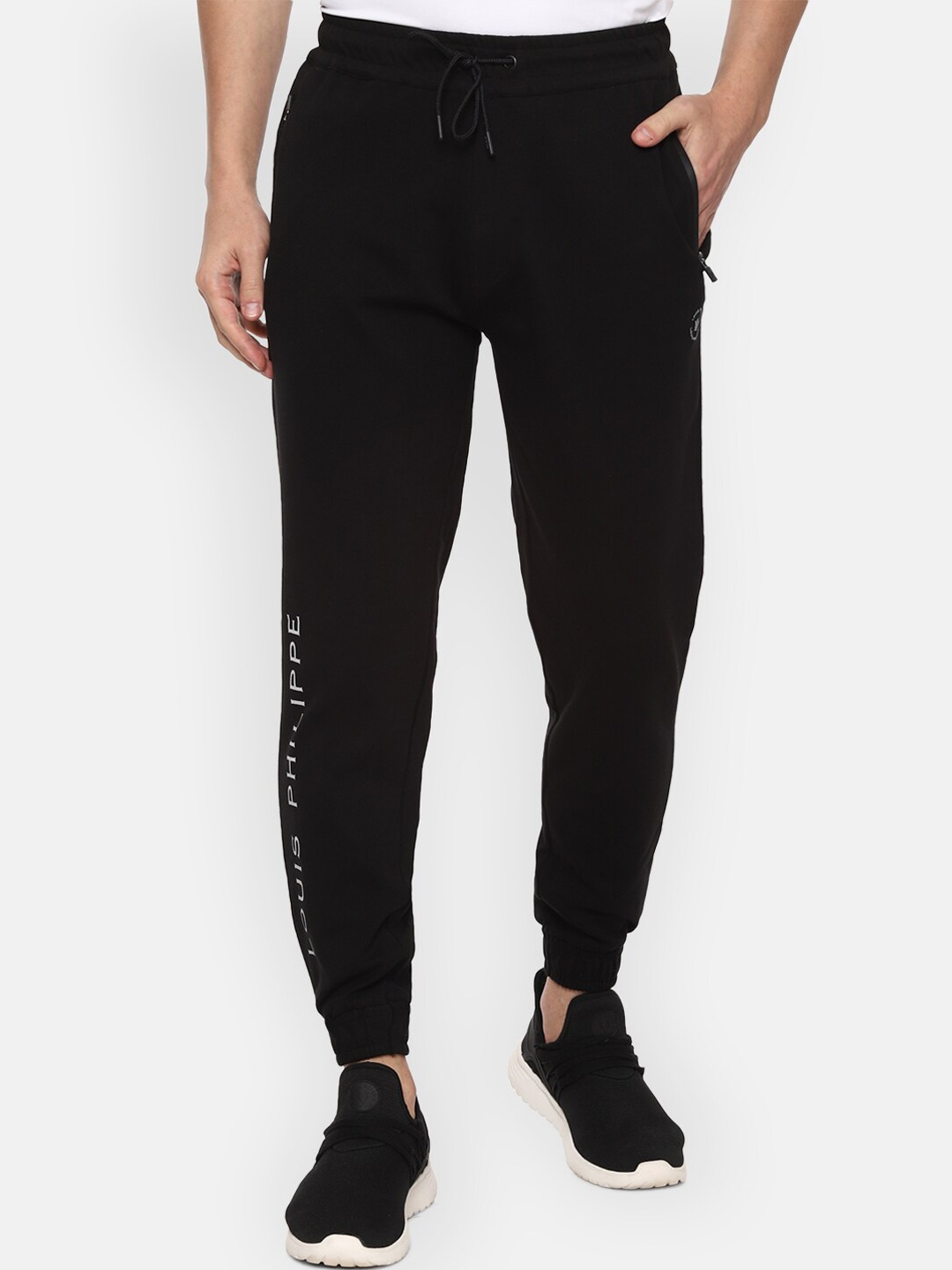 

Louis Philippe ATHPLAY Men Black & White Solid Relaxed-Fit Joggers