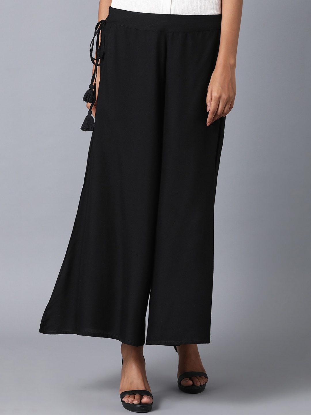 

elleven Women Black Solid Loose Fit Parallel Trousers