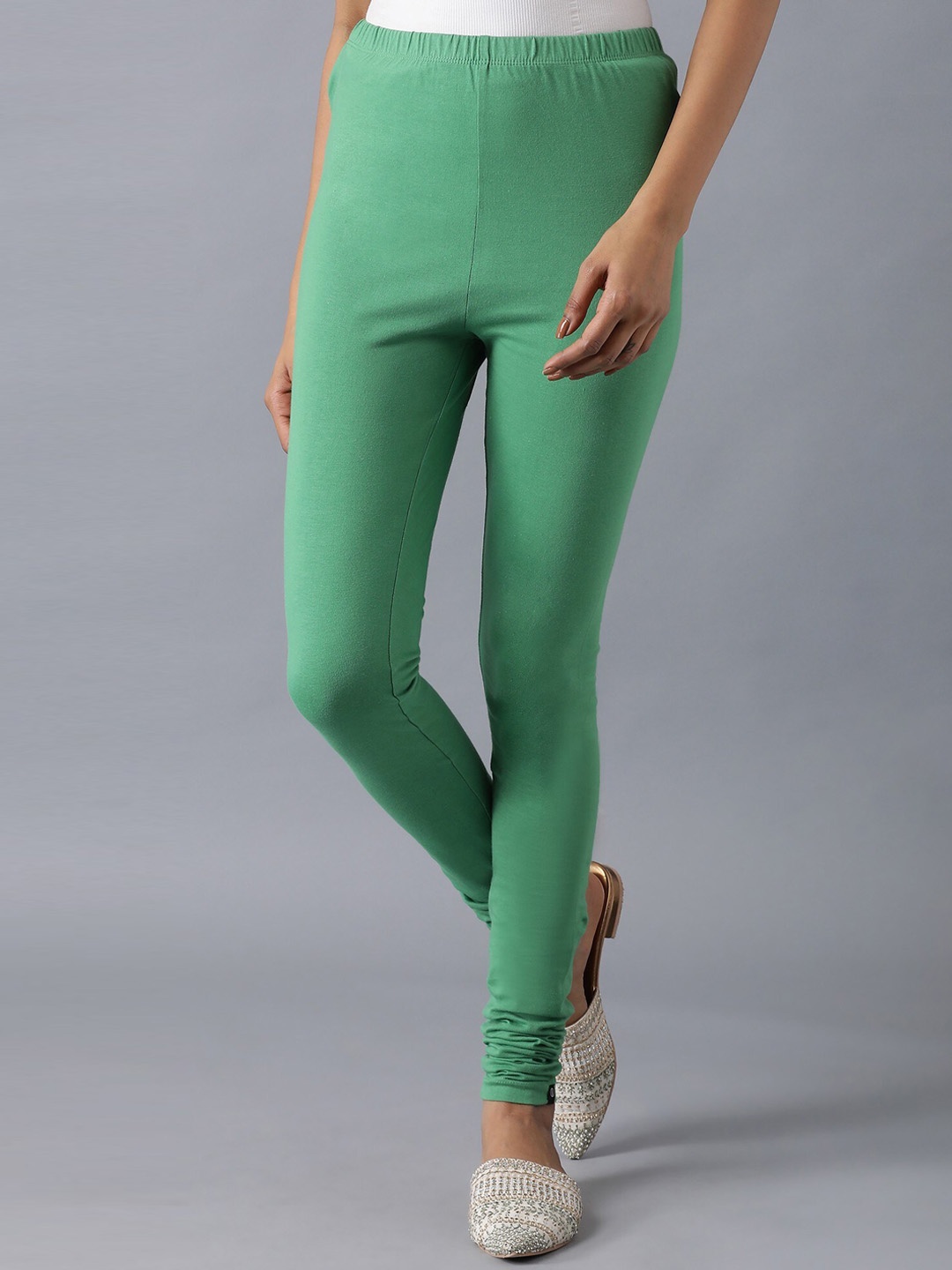

Elleven Women Green Solid Churidar