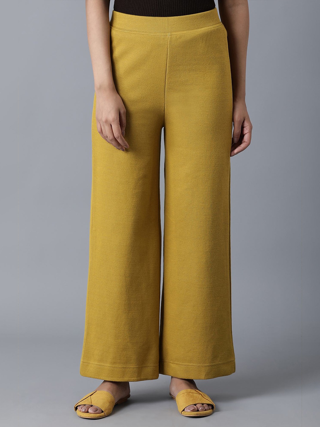 

elleven Women Mustard Yellow Solid Knitted Palazzos