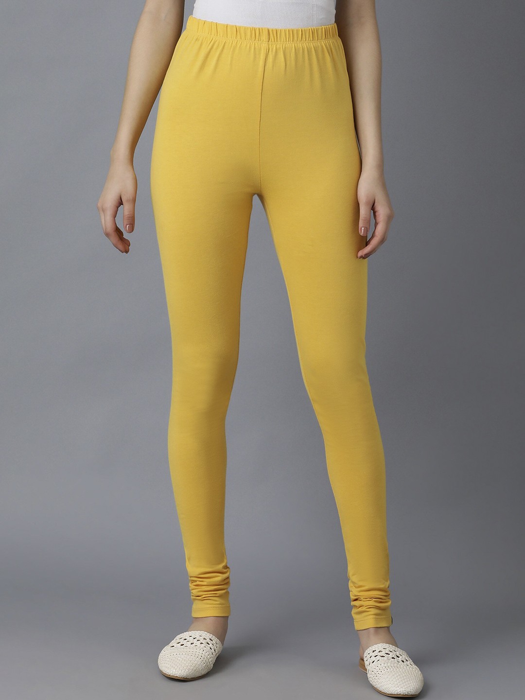 

Elleven Women Yellow Solid Mid Rise Cotton Churidar