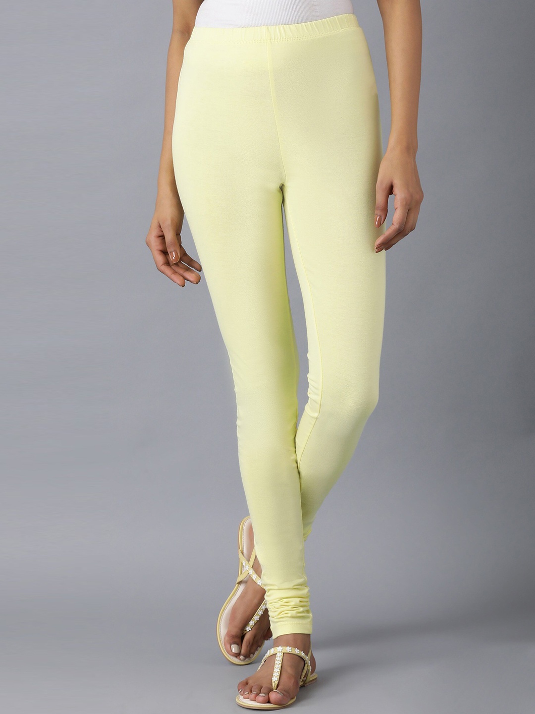 

Elleven Women Yellow Solid Slim Fit Pure Cotton Churidar