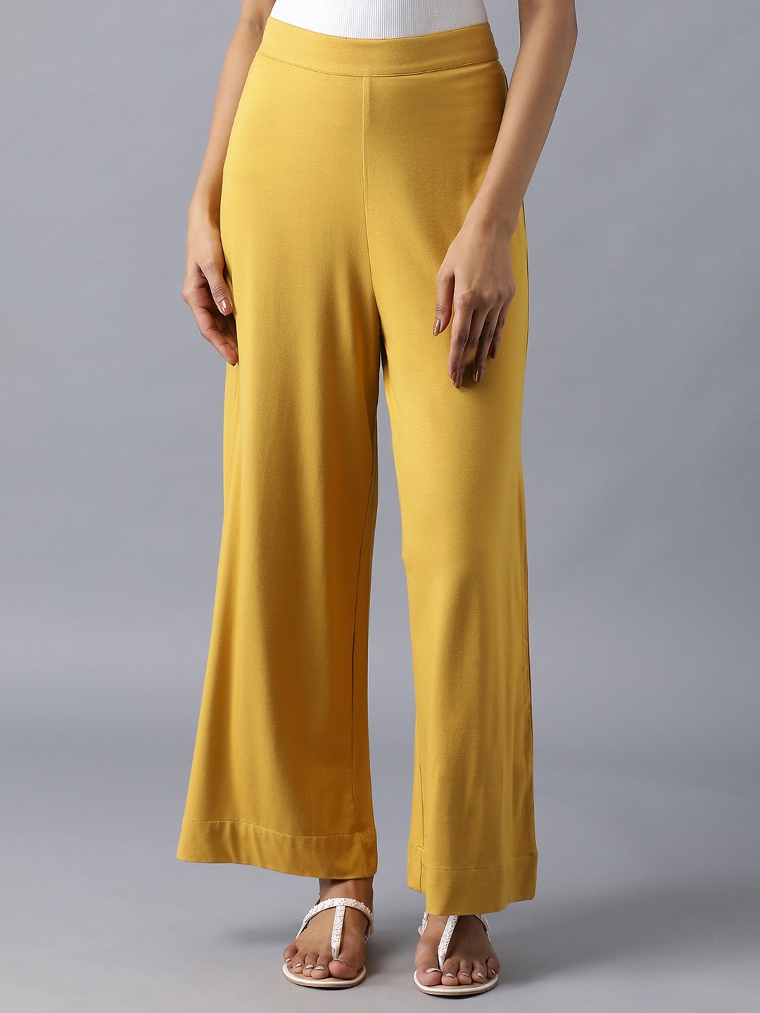 

elleven Women Mustard Yellow Solid Palazzos