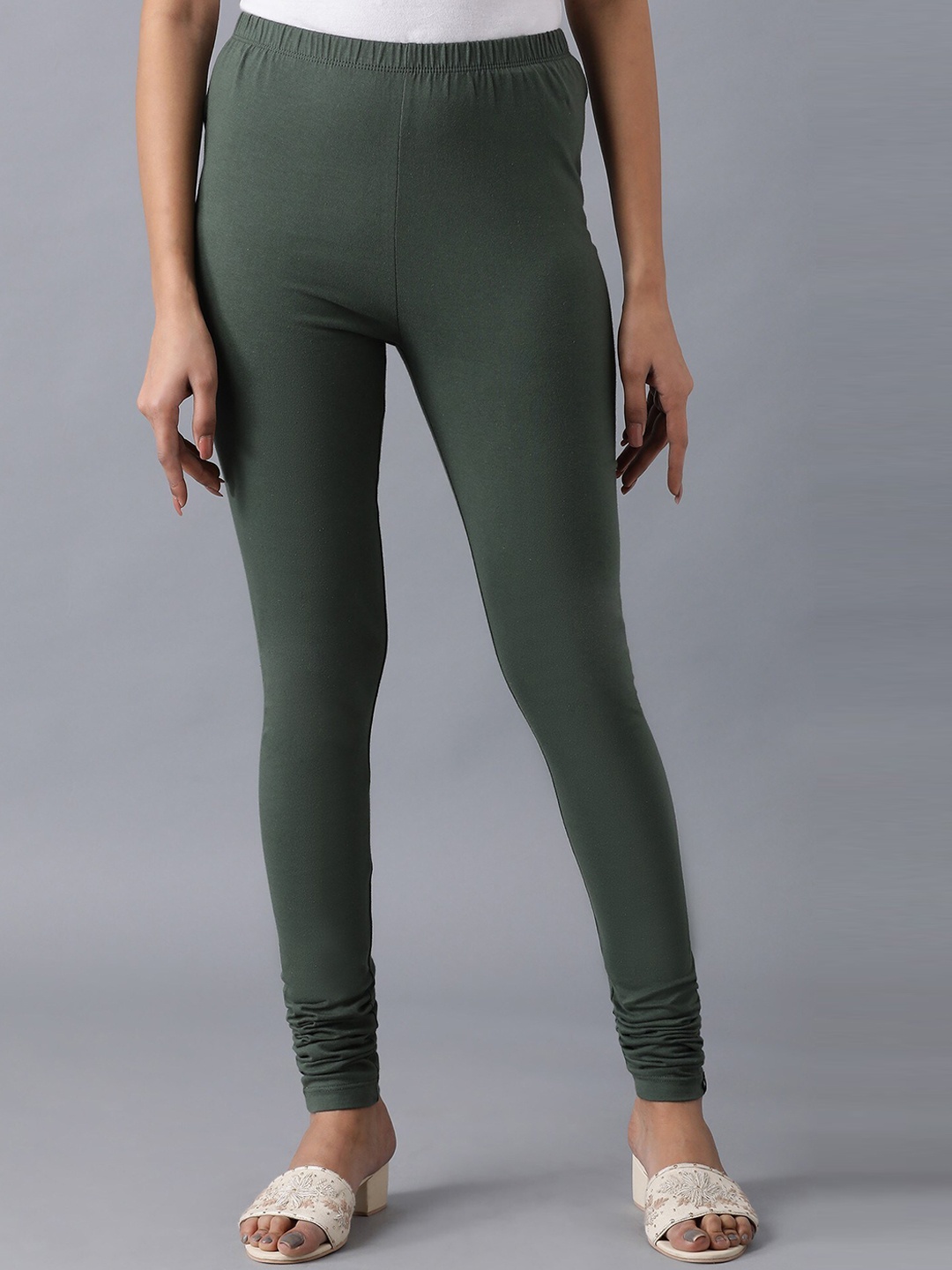 

Elleven Women Green Solid Churidar