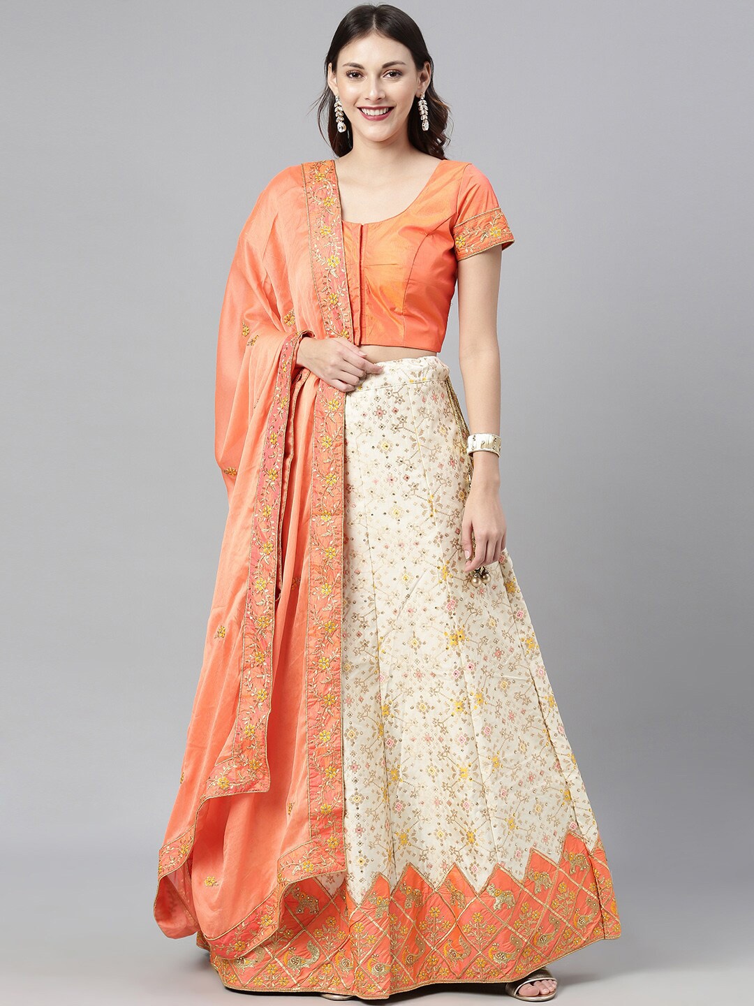 

The Chennai Silks Beige & Orange Woven Designed Ready To Wear Lehenga Choli with Dupatta