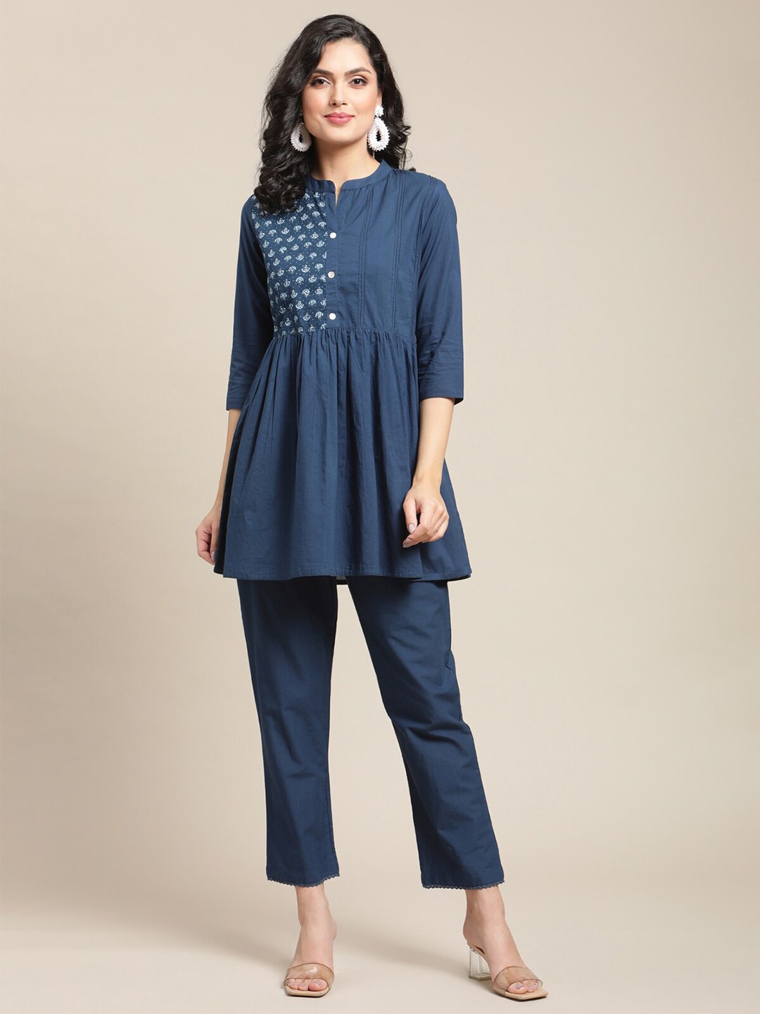 

Varanga Women Navy Blue Ethnic Motifs Printed Empire Pure Cotton Kurti with Trousers