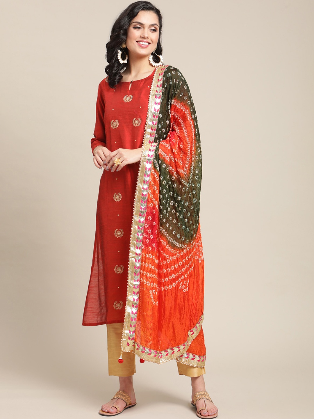 

Varanga Women Rust Printed Regular Kurta with Trousers & With Dupatta