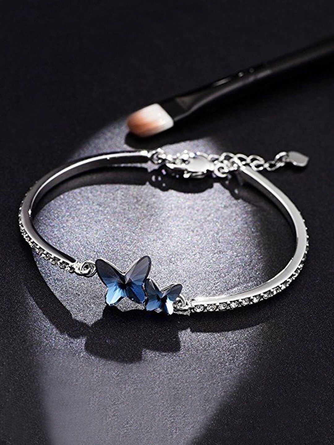 

Yellow Chimes Women Silver-Toned & Blue Crystals Rhodium-Plated Link Bracelet