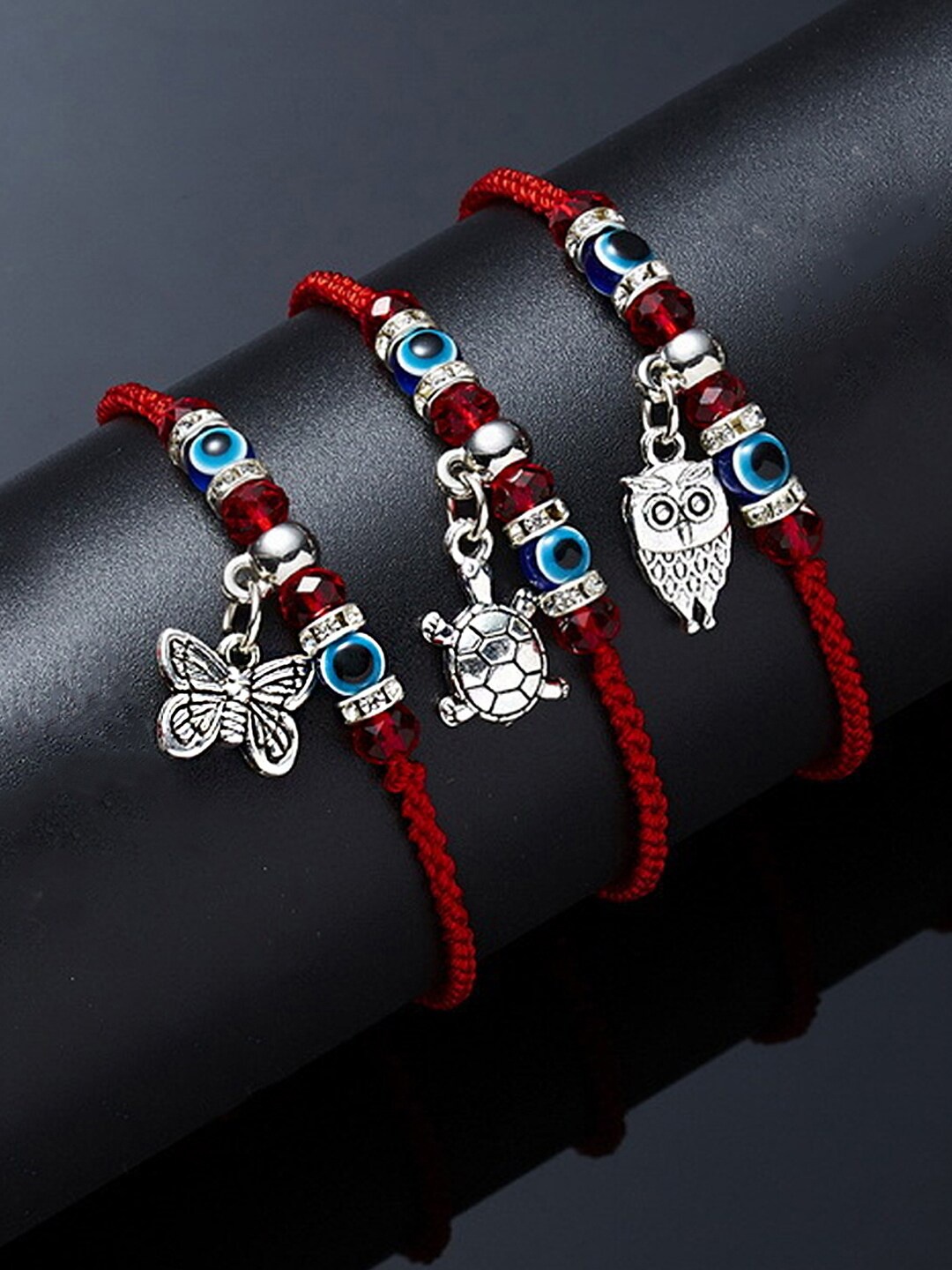 

Yellow Chimes Women Set Of 3 Red & Blue Oxidised Silver-Plated Charm Bracelet