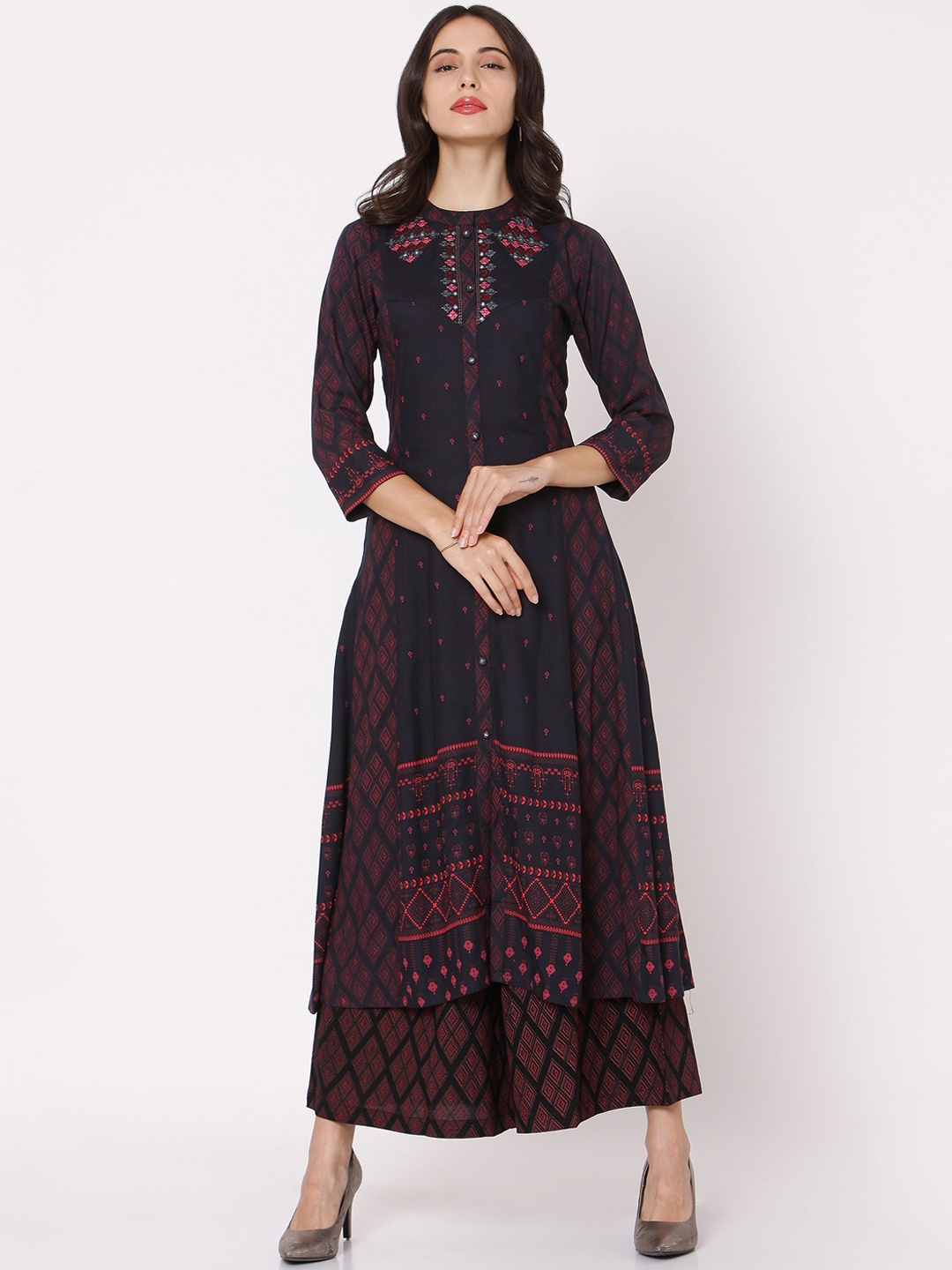 

Ojas Designs Women Black Embroidered Regular Kurta with Palazzos