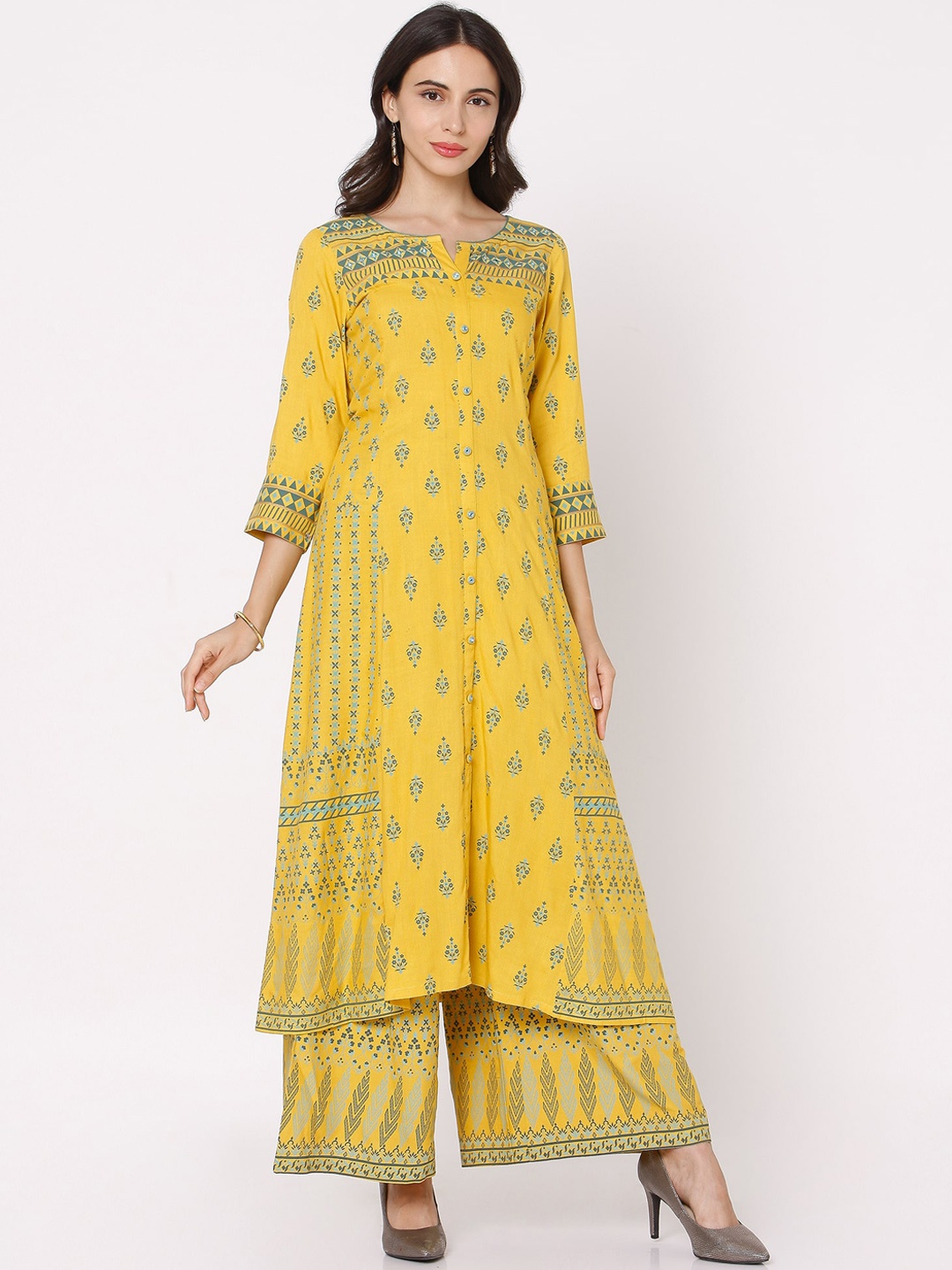 

Ojas Designs Women Yellow Ethnic Motifs Printed Pleated Kurta with Palazzos