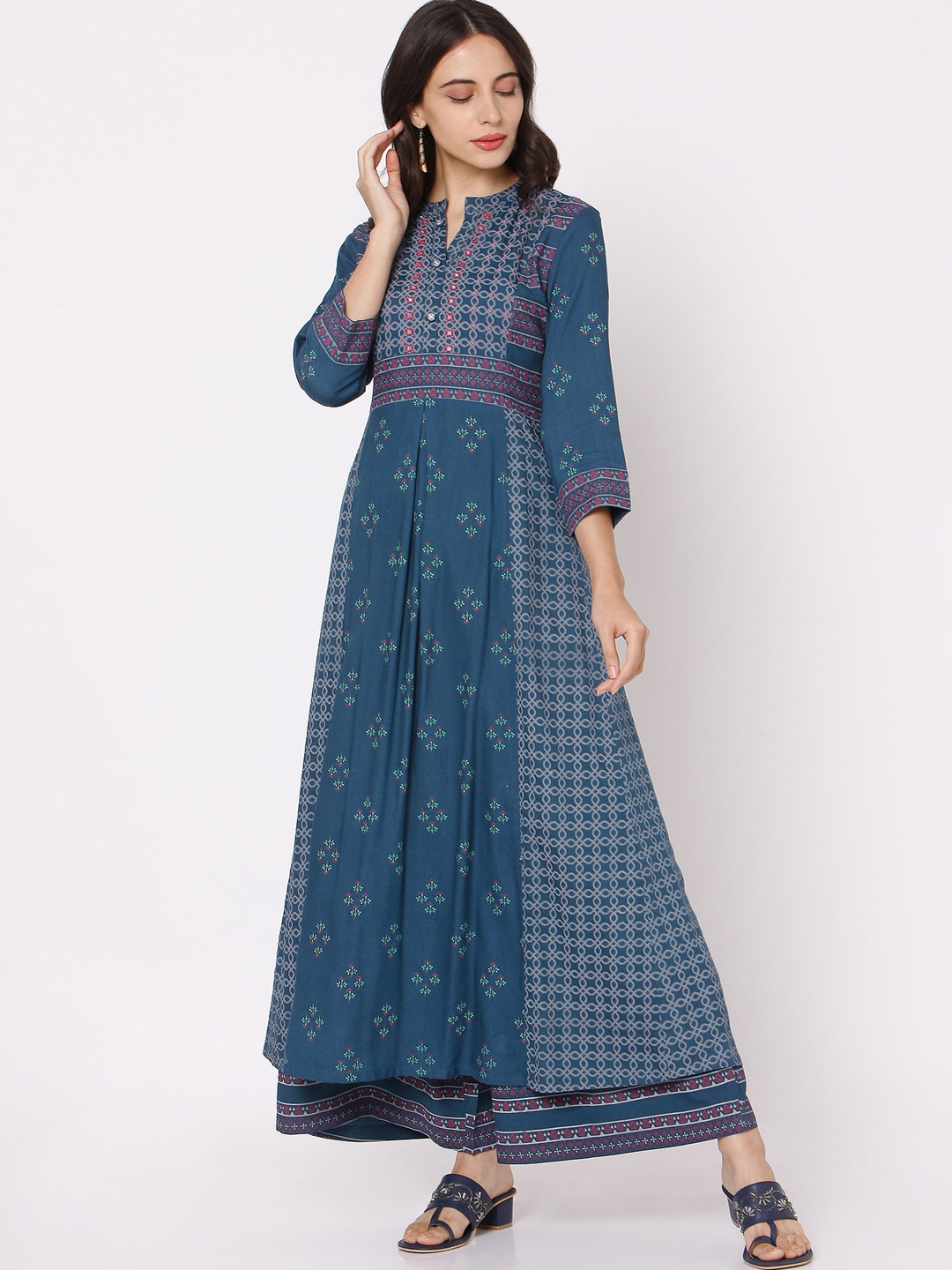 

Ojas Designs Women Blue Ethnic Motifs Printed Panelled Thread Work Kurta with Palazzos