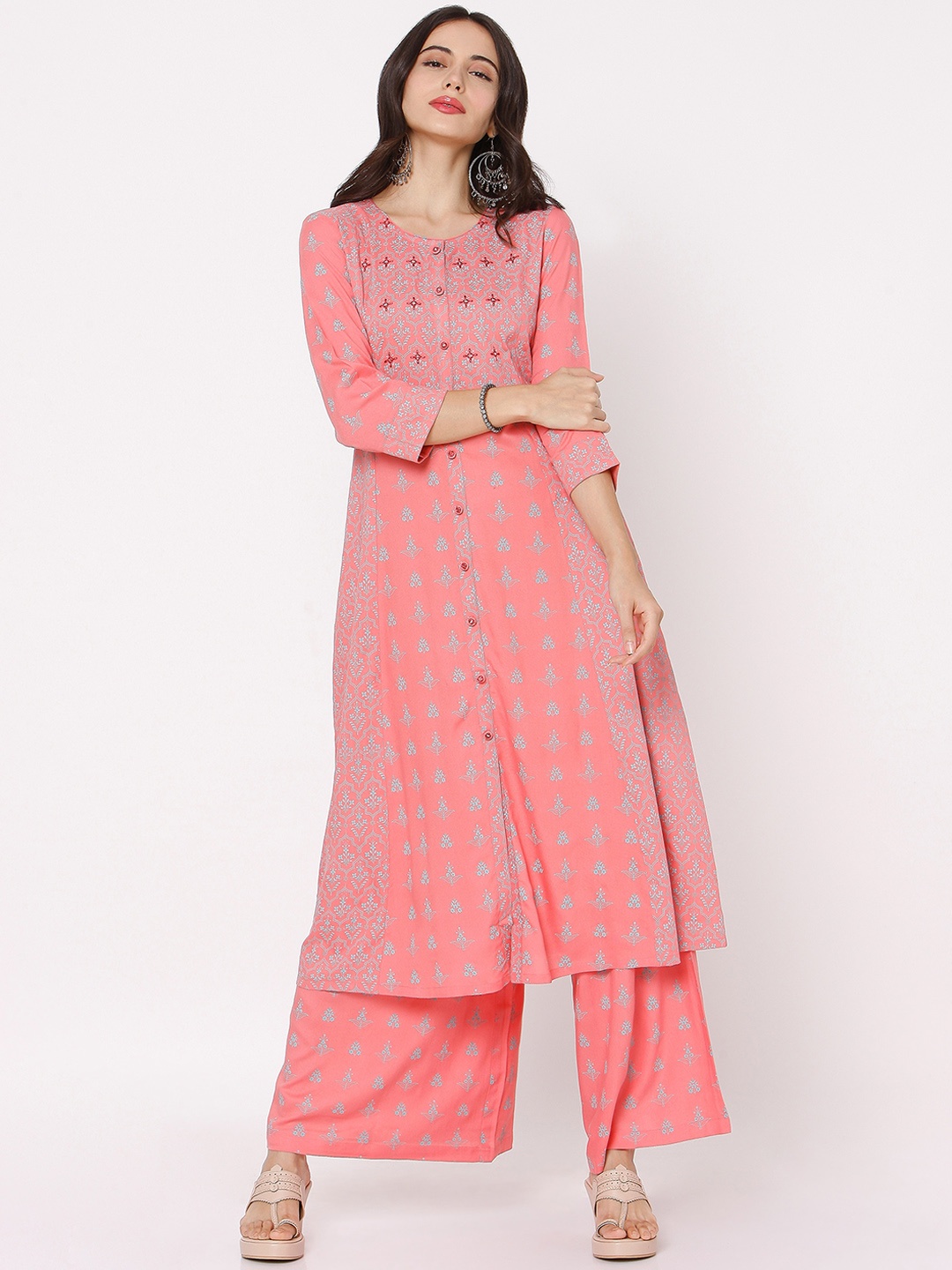 

Ojas Designs Women Peach-Coloured Printed Regular Kurti with Palazzos