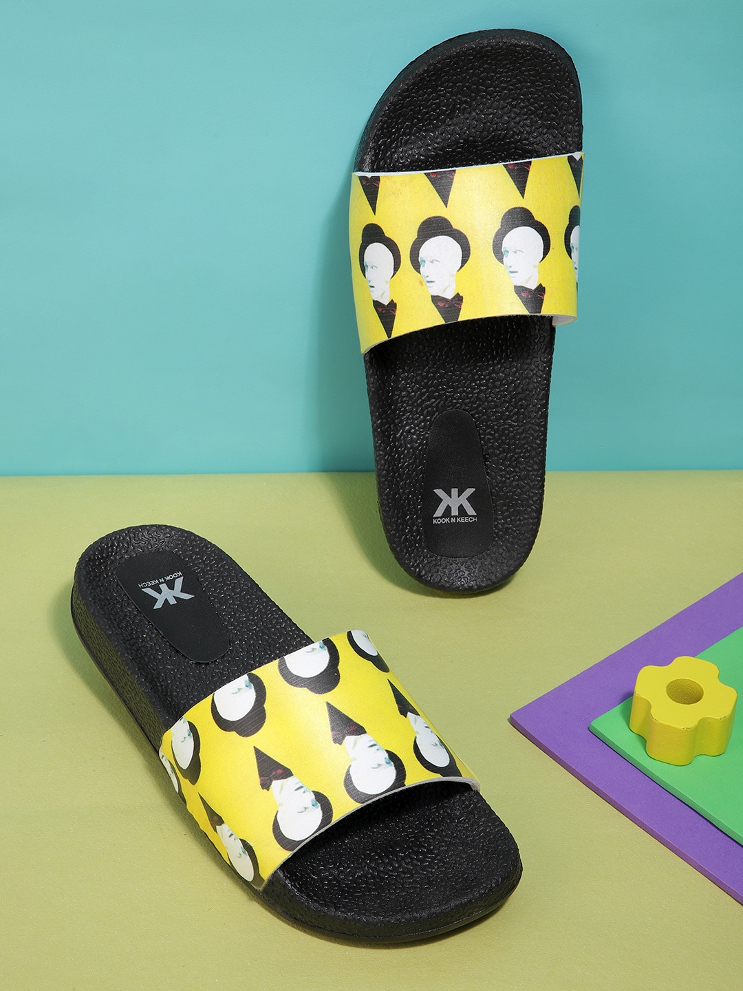 

Kook N Keech Women Yellow & Black Printed Sliders