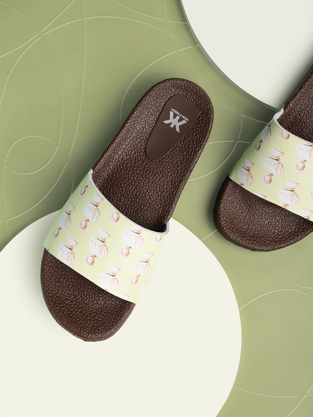 

Kook N Keech Women Yellow & Beige Printed Sliders