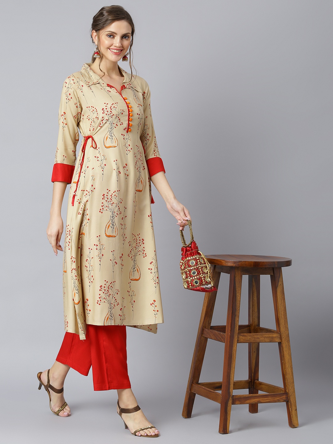 

Khushal K Women Beige Floral Printed Regular Kurta with Palazzos