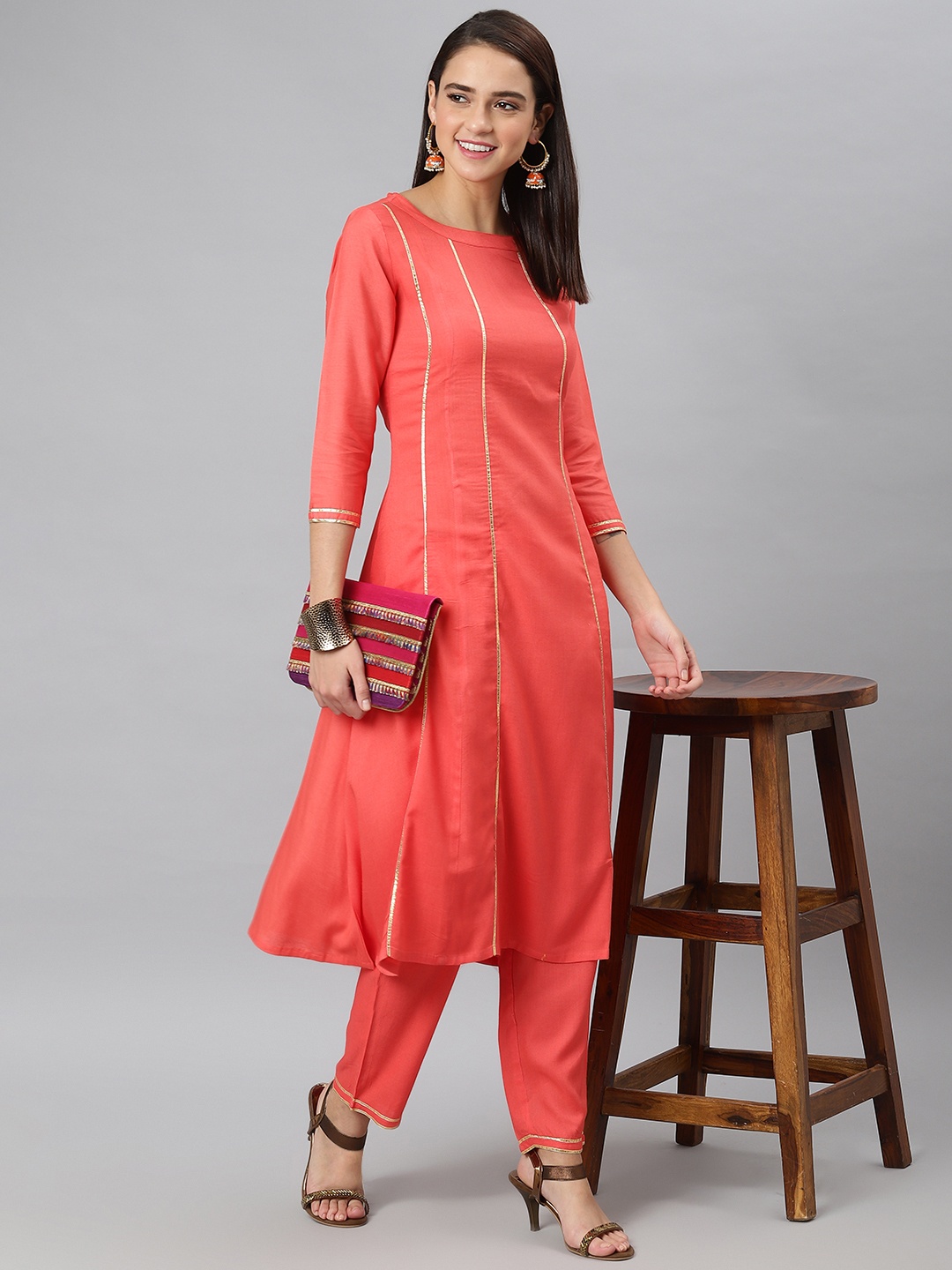 

Khushal K Women Red Striped Kurta with Palazzos