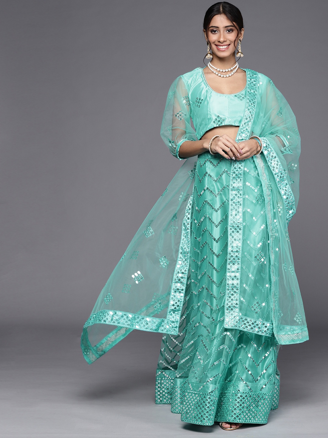 

Chhabra 555 Turquoise Blue Embroidered Mirror Work Semi-Stitched Lehenga & Unstitched Blouse With Dupatta