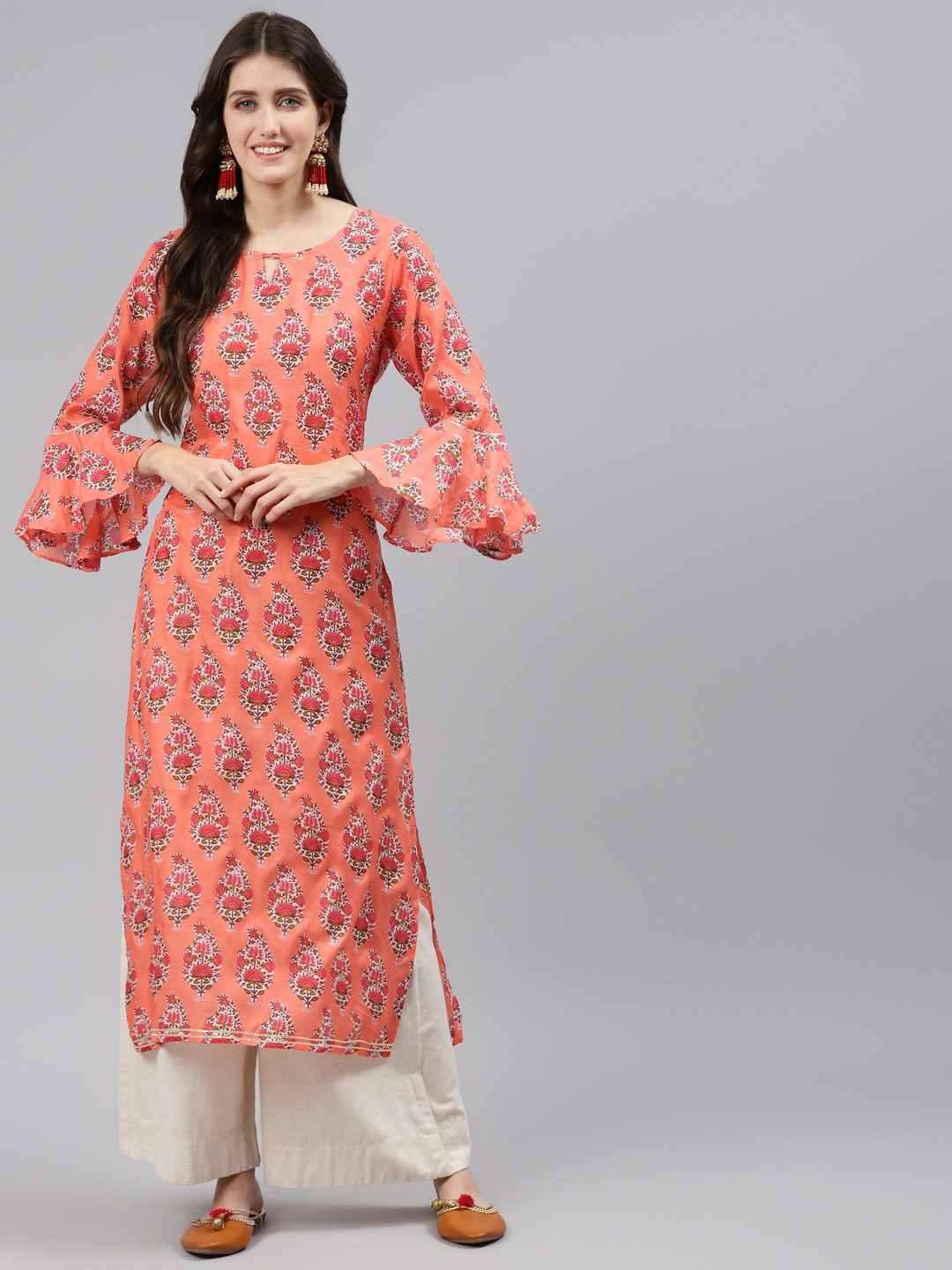 

Readiprint Fashions Women Peach-Coloured Floral Keyhole Neck Bell Sleeves Kurta