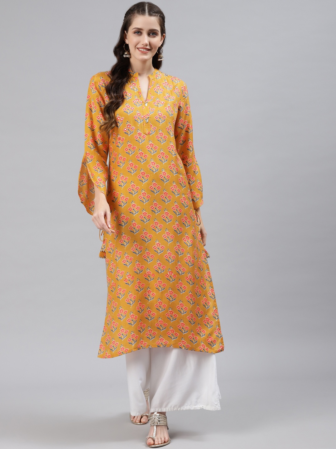 

Readiprint Fashions Women Mustard Yellow Floral Printed Bell Sleeves Kurta