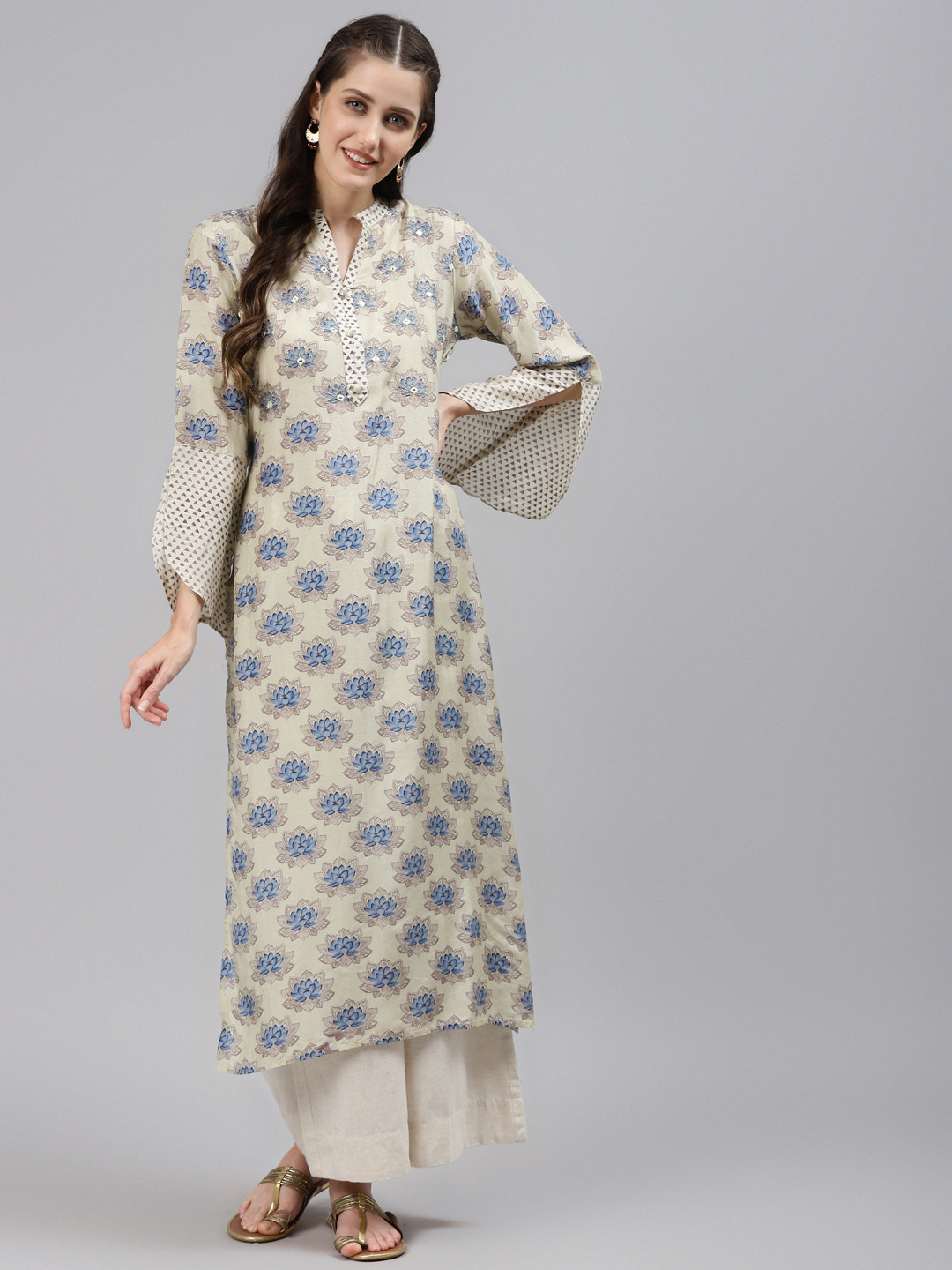 

Readiprint Women Cream-Coloured & Blue Ethnic Motifs Mirror Work Kurta