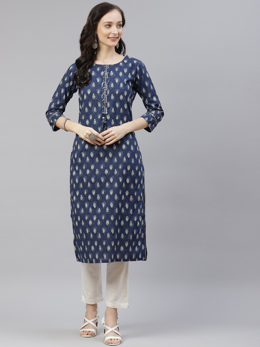 

Divena Women Blue & White Floral Printed Mirror Work Kurta
