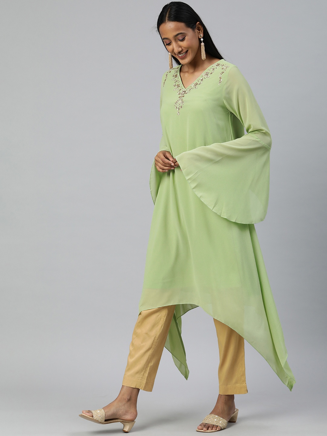 

Global Desi Women Green Floral Yoke Design V-Neck Flared Sleeves Kurta