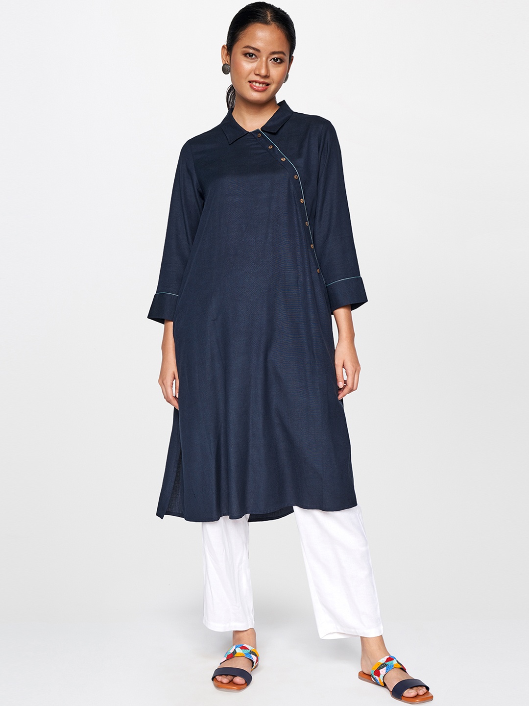 

Global Desi Women Blue Solid Shirt Collar A-line Kurta