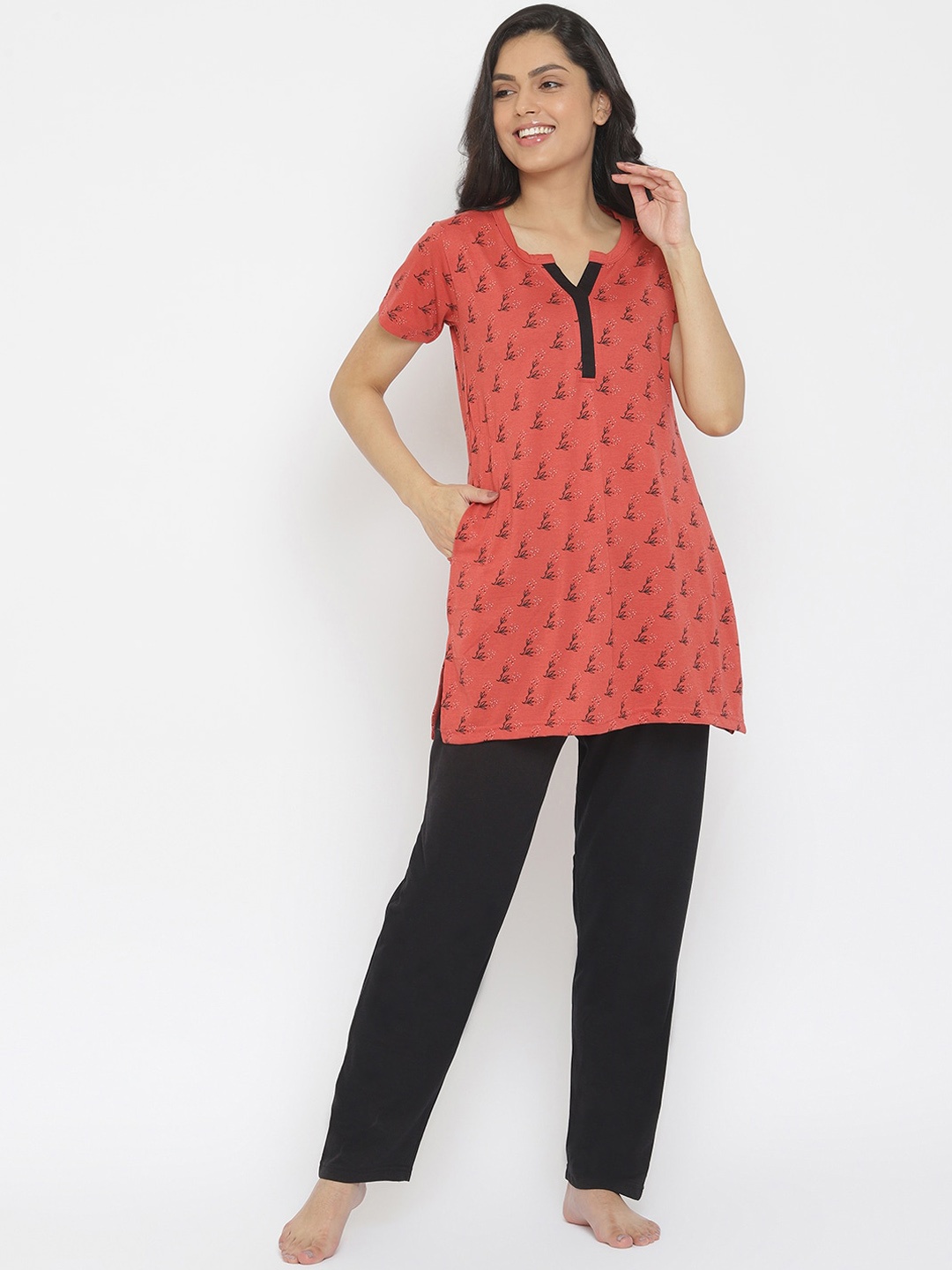 

Duchess Women Pink & Black Printed Night Suit