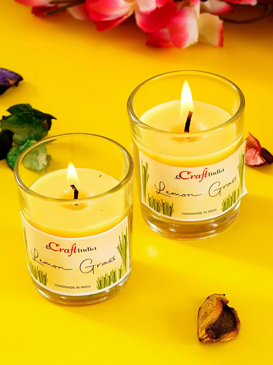 

eCraftIndia Set Of 2 Yellow Lemon Grass Scented Glass Candles