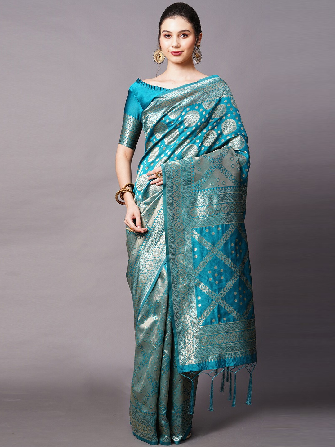 

Mitera Teal Blue & Gold-Toned Ethnic Motifs Zari Banarasi Saree