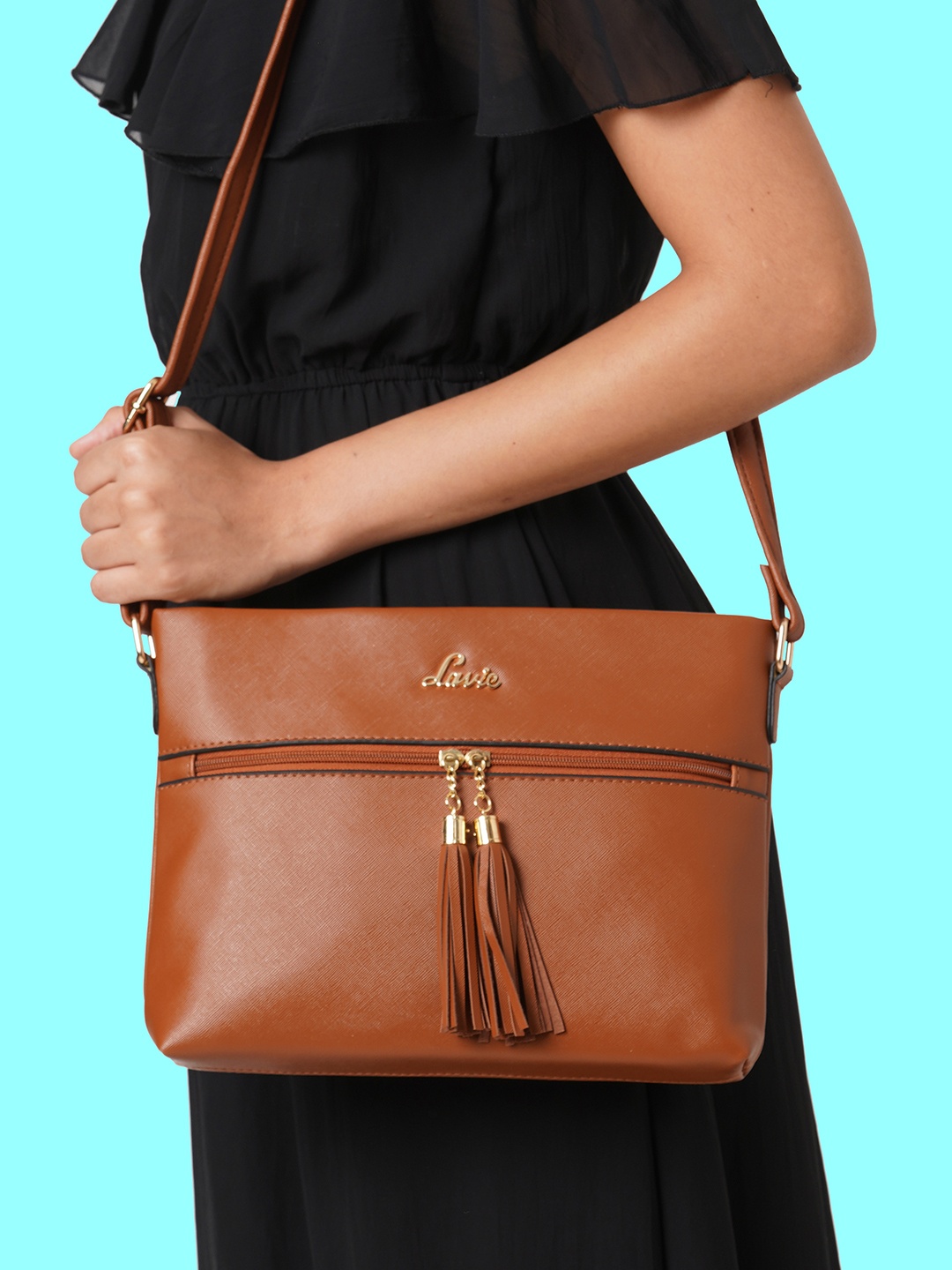 

Lavie Brown PU Structured Sling Bag with Tasselled