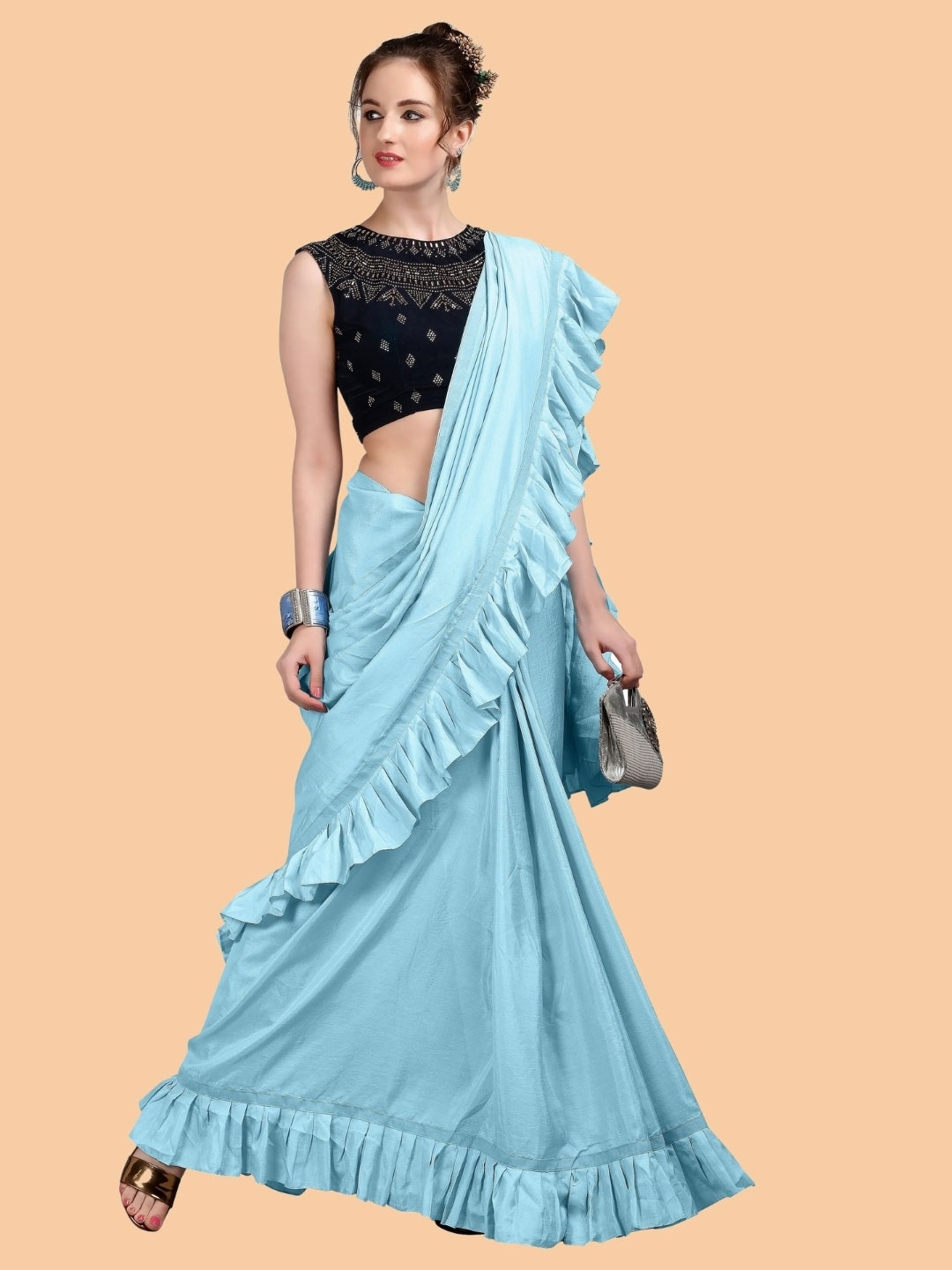 

Mitera Turquoise Blue Embellished Beads and Stones Silk Blend Saree