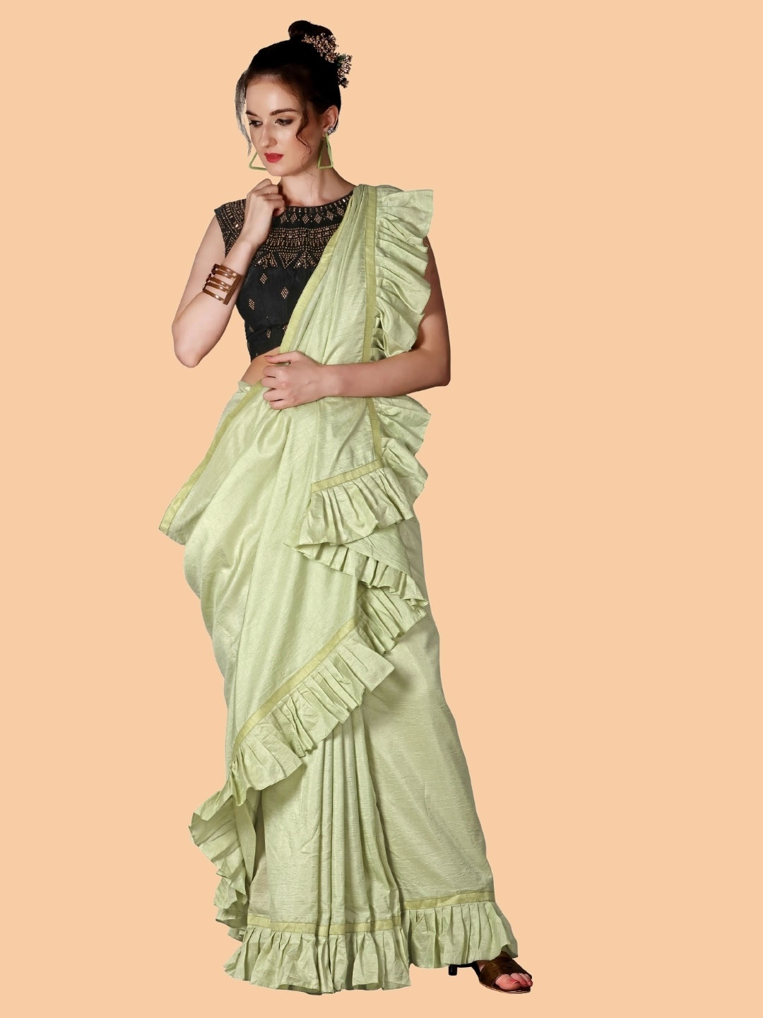 

Mitera Green Embellished Beads and Stones Silk Blend Saree