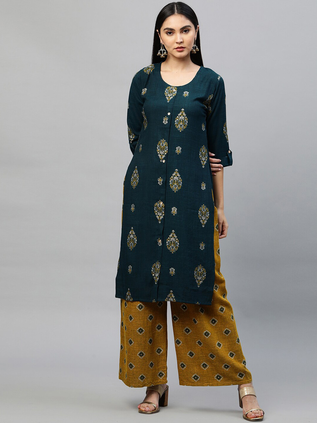 

FASHOR Women Teal Embroidered Angrakha Kurti with Trousers