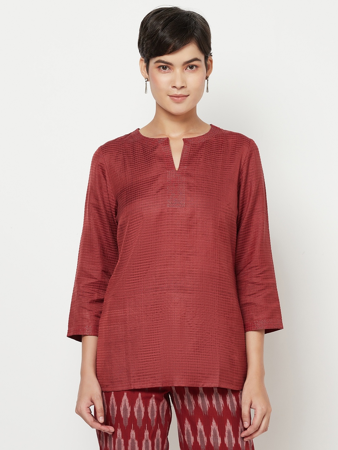 

Fabindia Maroon Woven Checked Kurti