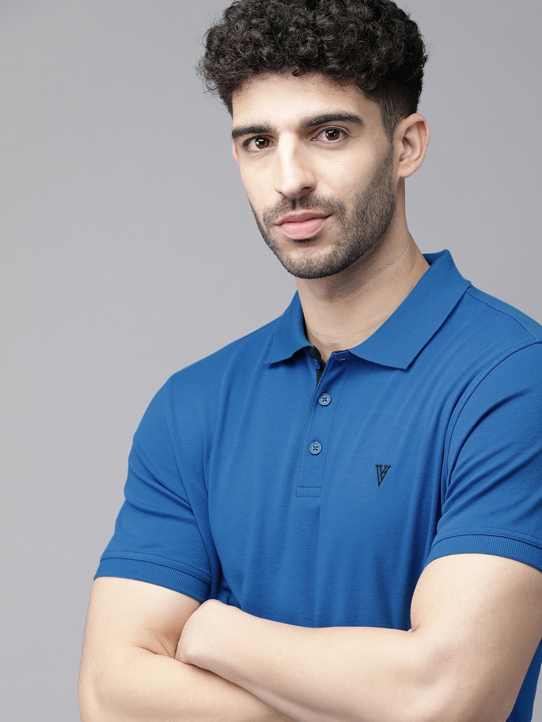 

Van Heusen Athleisure Men Solid Ultra Soft Short Sleeve Polo T-Shirt, Blue