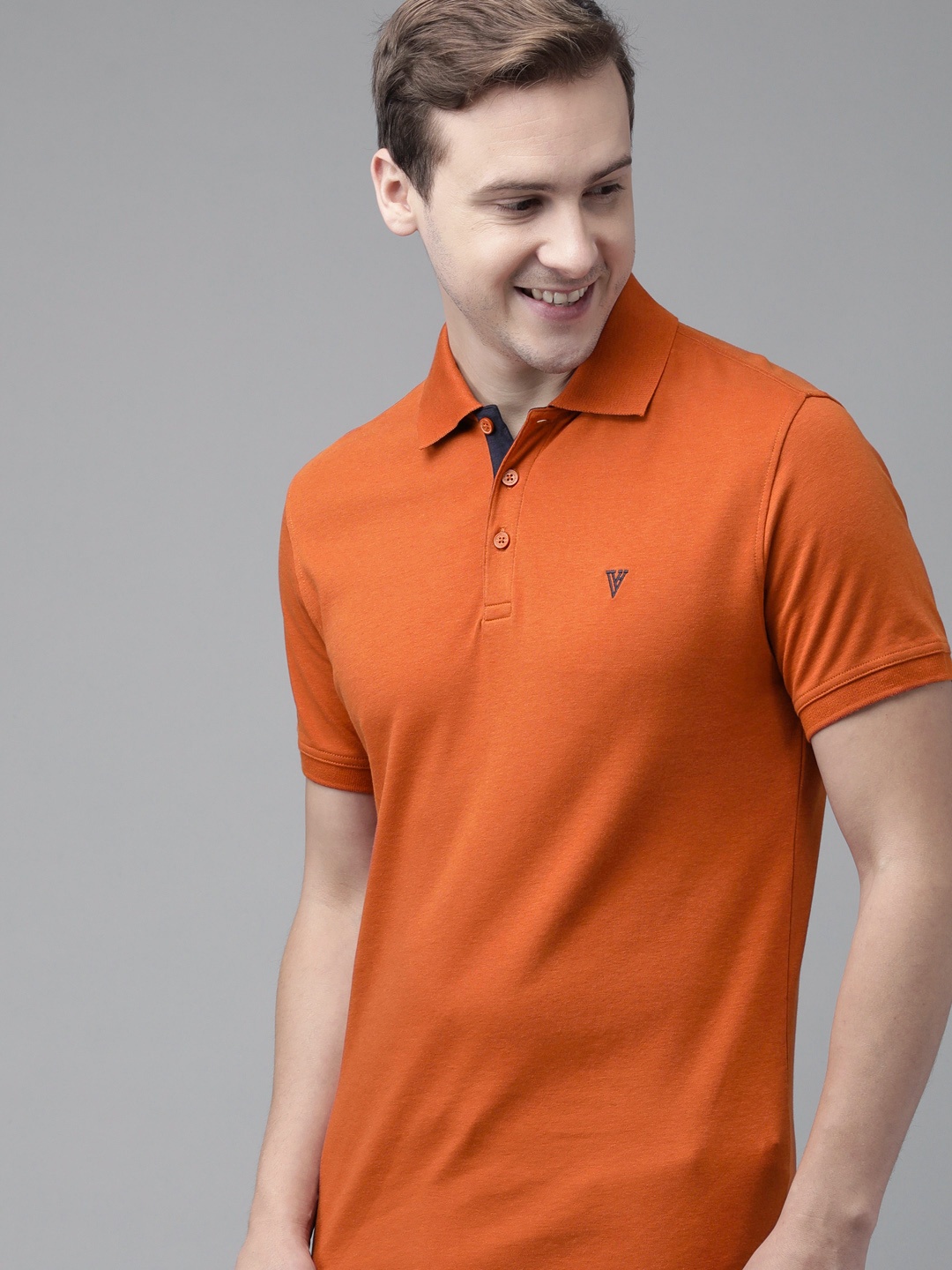 

Van Heusen Athleisure Men Solid Ultra Soft Short Sleeve Polo T-Shirt, Orange