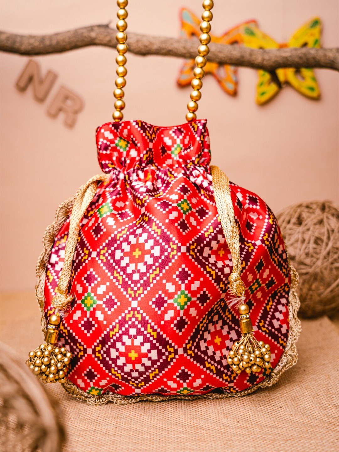 

NR By Nidhi Rathi Pink & Orange Printed Potli Clutch