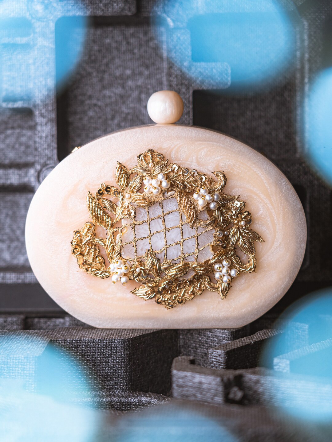 

NR By Nidhi Rathi Peach-Coloured & Gold-Toned Stone Resin Embellished Box Clutch