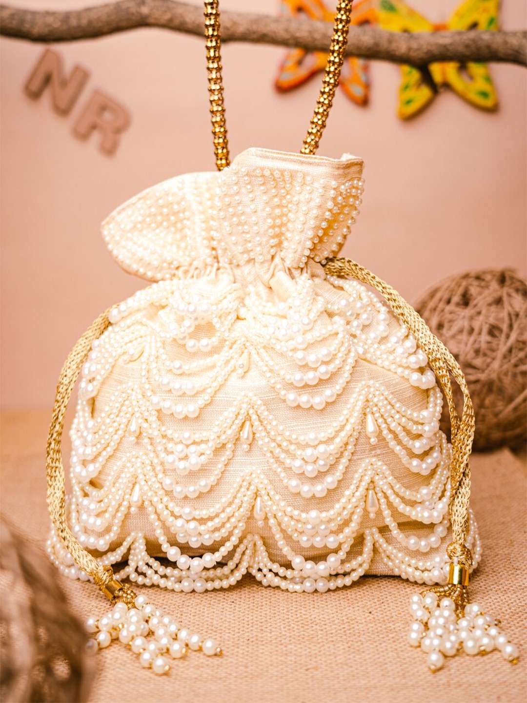 

NR By Nidhi Rathi Women Cream-Coloured & Gold-Toned Embroidered Potli Clutch