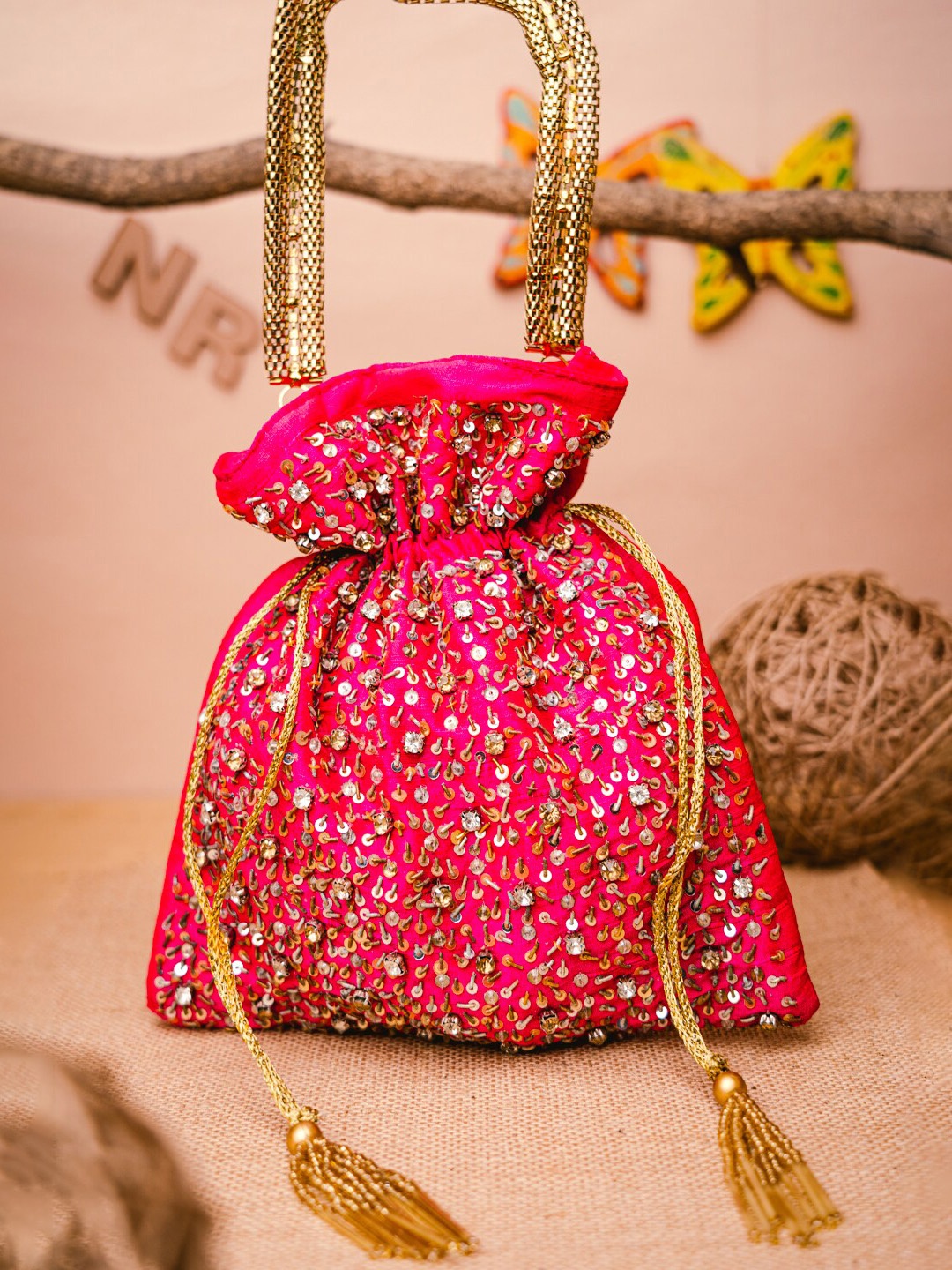 

NR By Nidhi Rathi Pink & Gold-Toned Embroidered Potli Clutch