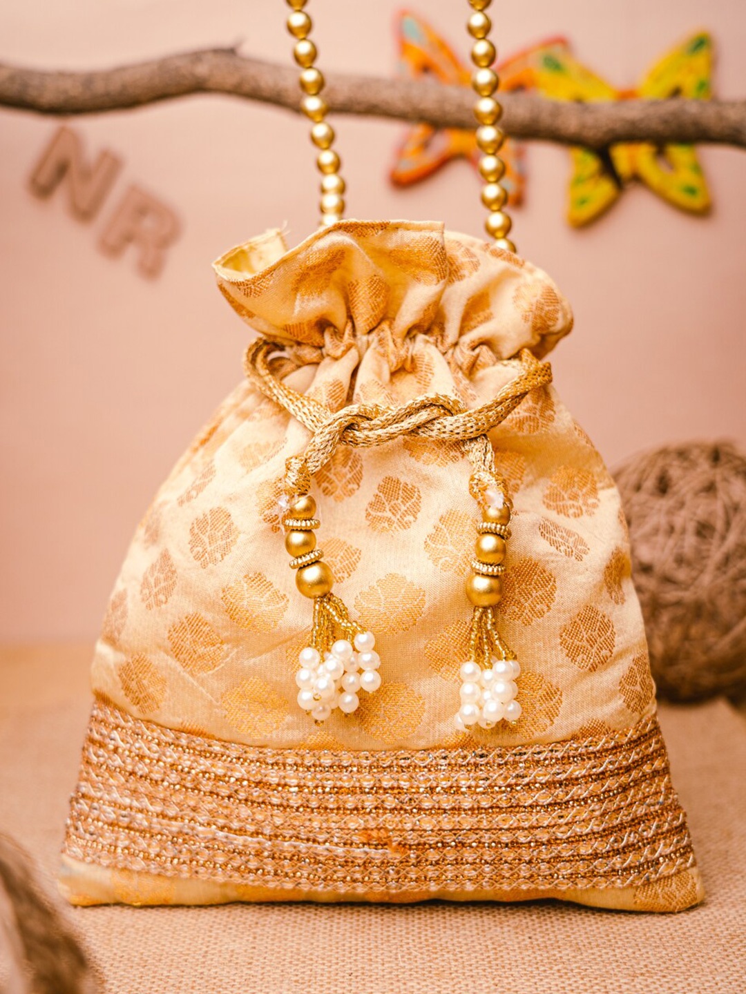 

NR By Nidhi Rathi Gold-Toned & White Embellished Potli Clutch