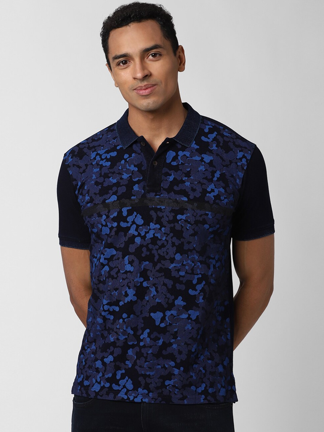 

Peter England Casuals Men Navy Blue Printed Polo Collar Slim Fit Cotton T-shirt