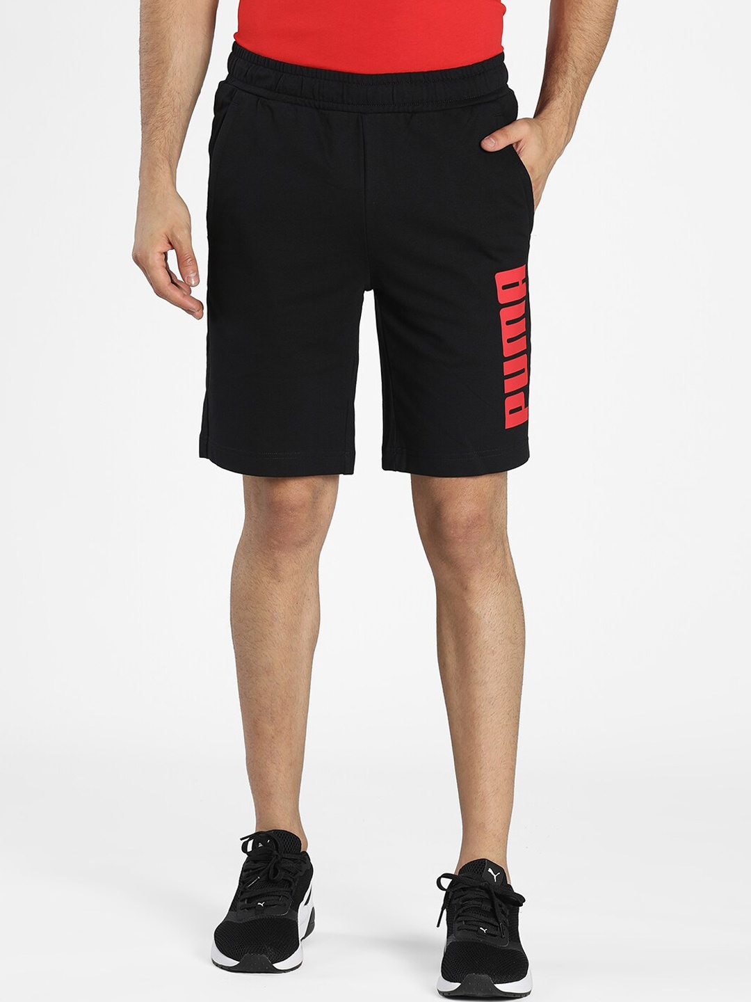 

Puma Men Black Graphic Knitted Shorts