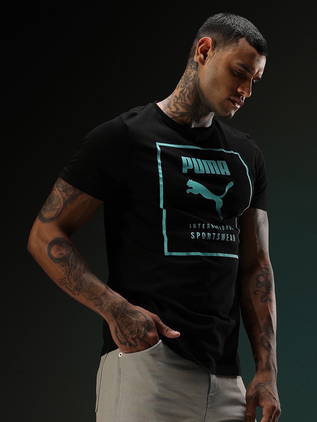 

Puma Men Black & Turquoise Blue Brand Logo Printed Slim Fit T-shirt