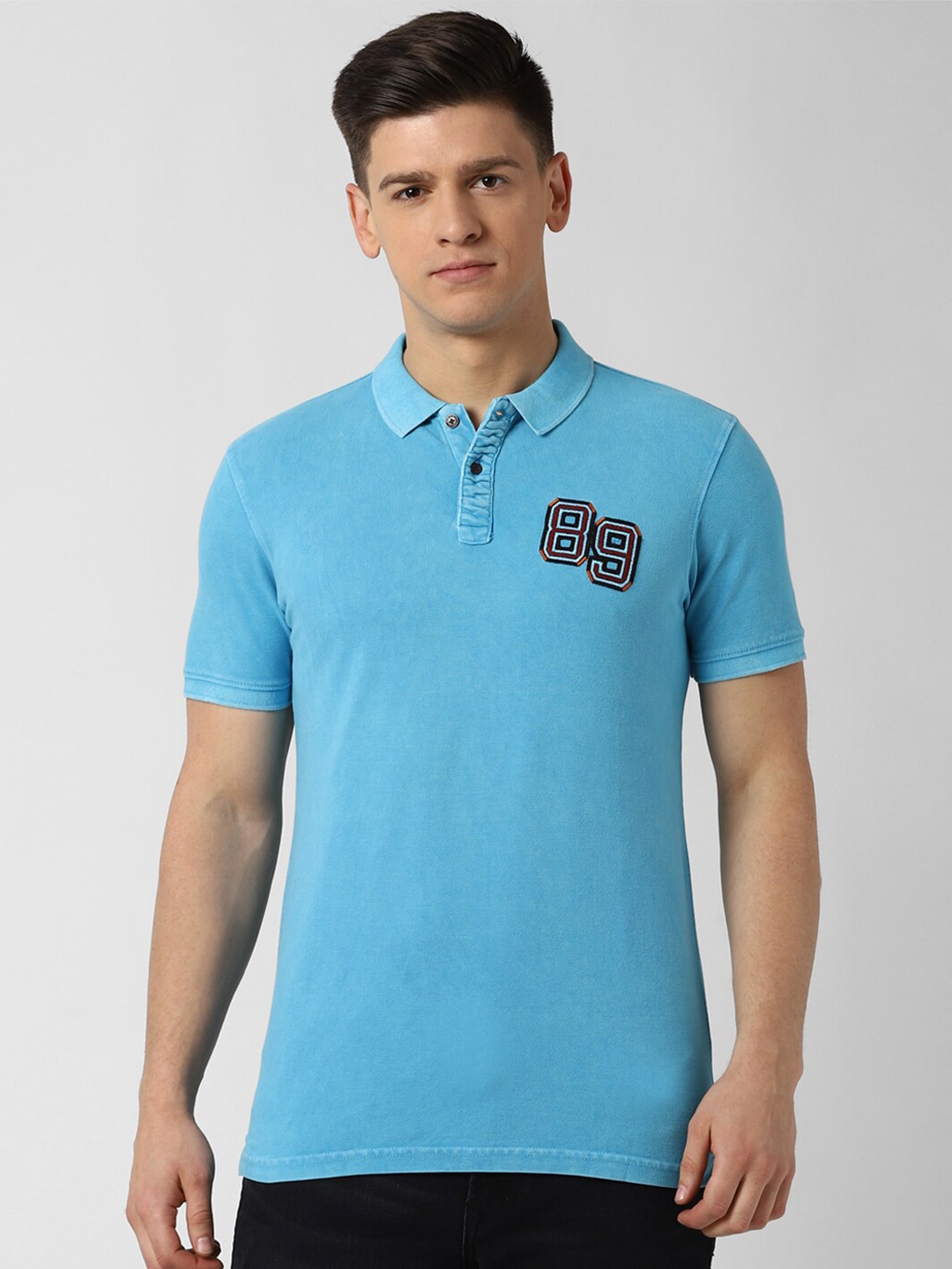 

Peter England Casuals Men Blue Polo Collar Applique Slim Fit T-shirt